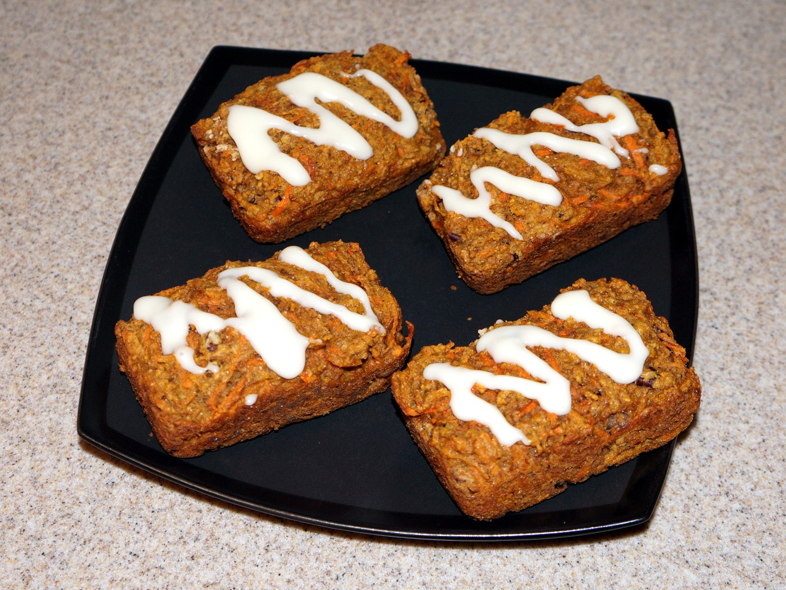 Mini carrot cake loaves with cream cheese drizzle