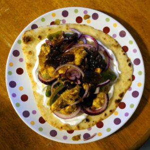 Chicken tikka masala naan pizza