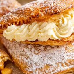 Apple turnover with whipped cream